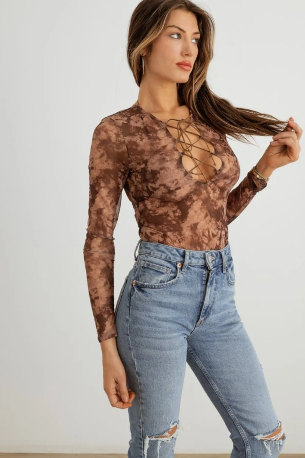 Abstract Mesh Lace-Up Long Sleeve Bodysuit - Trendy Women's Fashion Staple for a Chic Look!