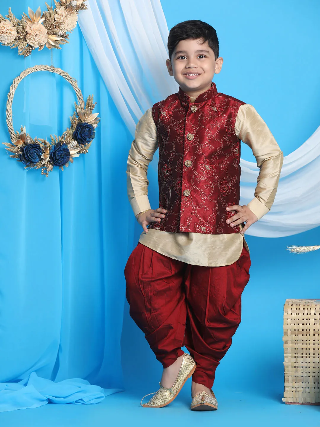 Vastramay Boy's Maroon Embroidered Nehru Jacket With Gold Kurta And Maroon Dhoti Set